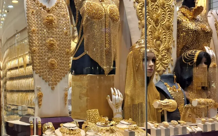 Gold necklaces on display in a jewellery showroom window, for jewellery chains and their suppliers