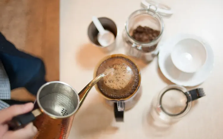 Private label pocket scales for coffee, tea and kitchen brands Hot water being poured over coffee in a pour-over brewer, for coffee, tea and kitchen brands