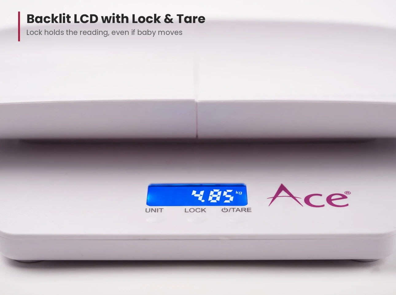 Backlit LCD with weight lock and tare Close-up of baby weighing scale backlit LCD with unit, lock and tare buttons